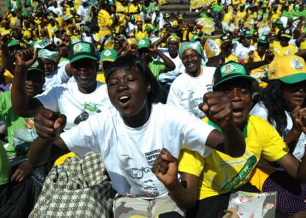 Mugabe supporters attend the rally in Harare ahead of this weeks election. Picture: AFP/Getty Images