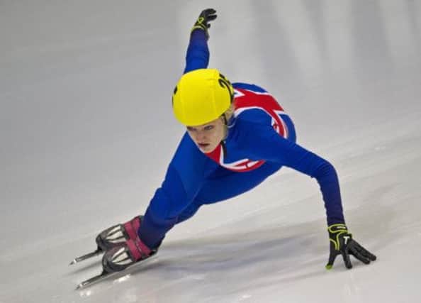 Short track speed skater Elise Christie is one to watch at next years Winter Olympics in Sochi, Russia. Picture: AFP/Getty