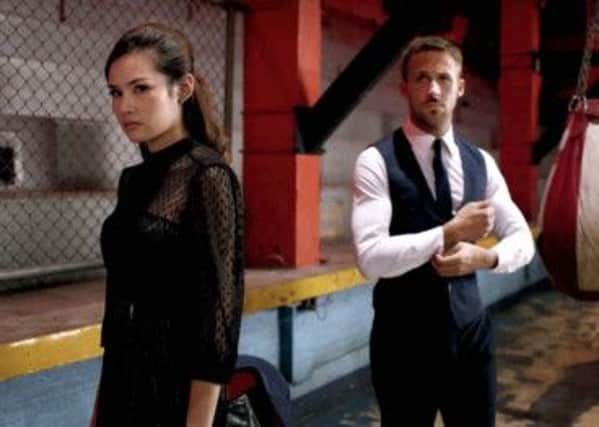 Ryan Gosling as Julian and Yahaying Rhatha Phongam as Mai in Only God Forgives