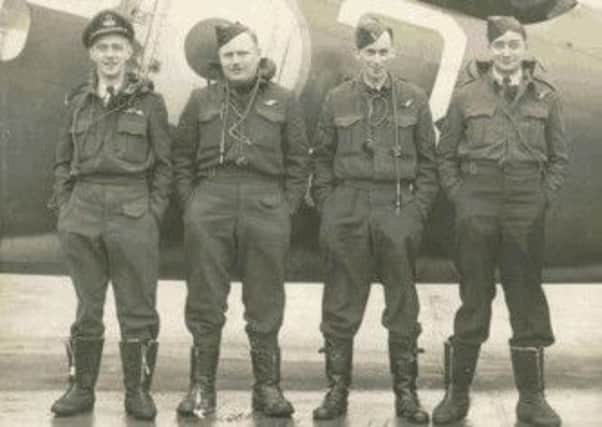 Ted Bracken (left) with his crew and their Dakota aircraft