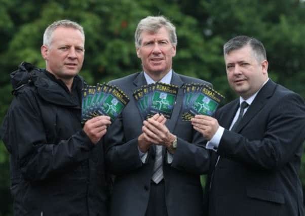 Malcolm Graham, Justice Secretary Kenny MacAskill and Lord Advocate Frank Mulholland launch the leaflet. Picture: PA