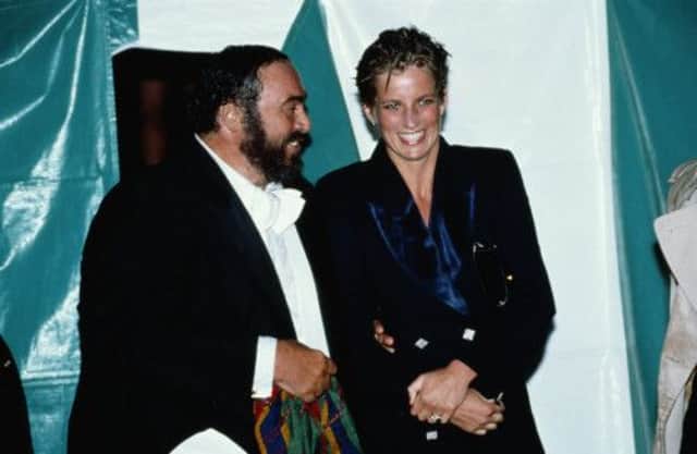 The Princess of Wales talks to Luciano Pavarotti during his 30th anniversary concert at Hyde Park in 1991. Picture: Getty