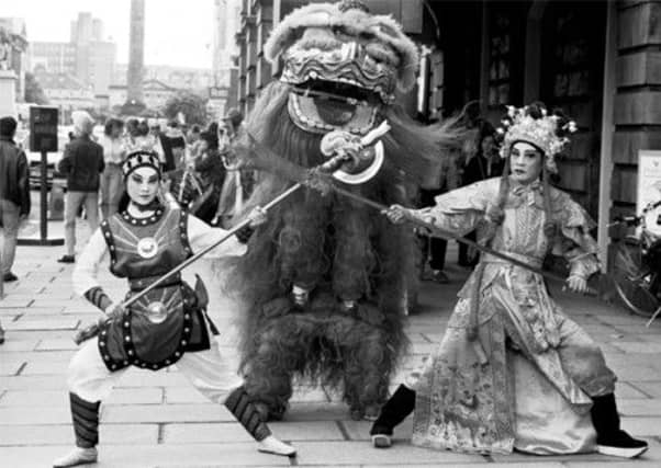 Members of the Chinese Theatre Circle outside the Assembly Rooms during the 1988 Fringe. Picture: TSPL
