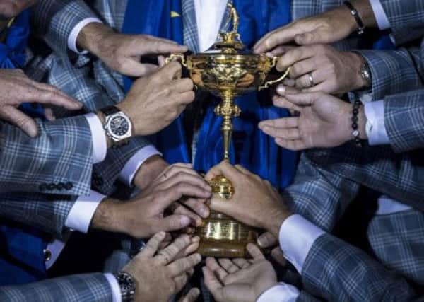 The winning European team hold the Ryder Cup at the Medinah Country Club last September. Picture: Getty