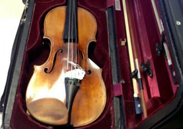 The violin dates from 1696, and was stolen from a violinist in London in 2010. Picture: AP