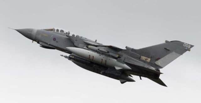An RAF Tornado takes off from  RAF Marham. An aircraft from the base was forced to land at Prestwick. Picture: PA