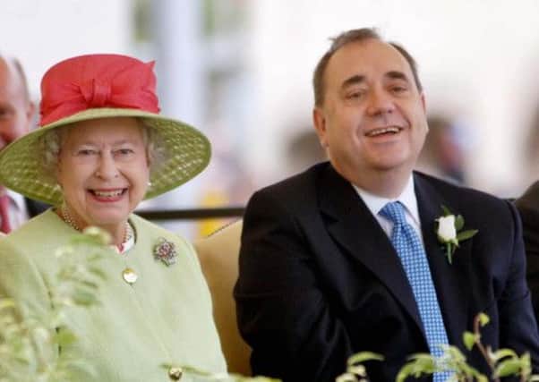 The Queen and Alex Salmond. Yes Scotland leaders have been asked to clarify their position on the monarchy. Picture: AFP