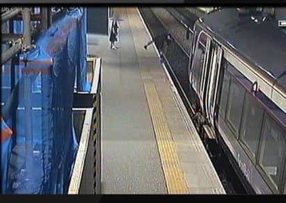 CCTV footage of a drunken football fan falling on rail tracks after kicking a pigeon has been released by Network Rail. Picture: Contributed
