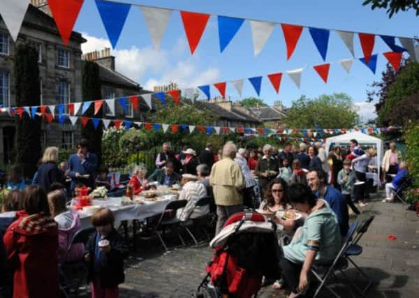 A Diamond Jubilee street party in Murrayfield Cress - events like this apparently left us happier than ever in 2012. Picture: Ian Rutherford