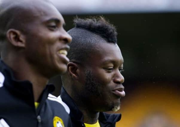 Former Liverpool star Djibril Cisse (background) in training at Fir Park. Picture: SNS