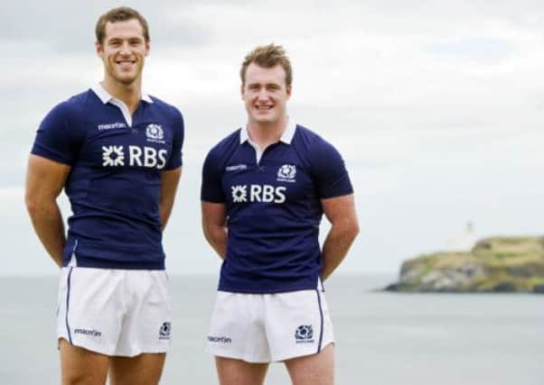 Scotland stars Tim Visser (left) and Stuart Hogg show off the new Scotland kit. Picture: SNS