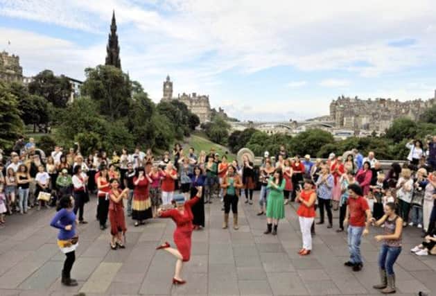 Scotland's biggest flamenco flashmob at the bottom of the Mound in Edinburgh. Picture: Phil Wilkinson