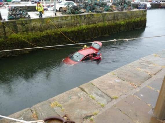 The car was eventually retrieved from Burghead Harbour. Pictures: Hemedia