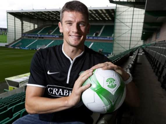 Owain Tudur Jones, modelling Hibs' new away kit, admits the Malmo result will never be forgotten. Picture: SNS