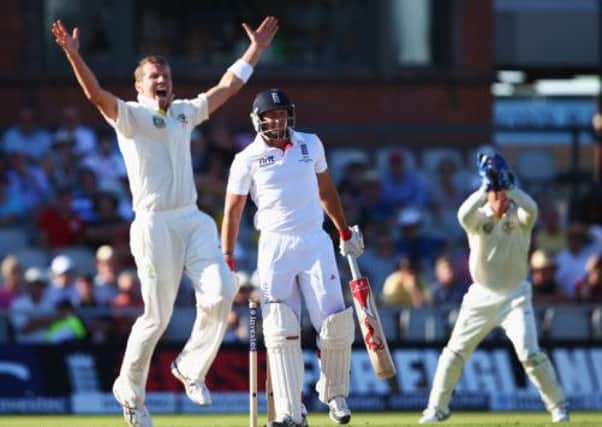 Peter Siddle celebrates the bonus wicket of nightwatchman Tim Bresnan late in the day. Picture: Getty