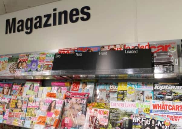 Tesco are to follow the lead of the Co-op in covering up the magazines. Picture: PA