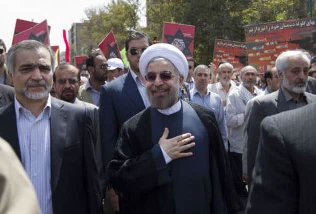 Iranian president-elect Hassan Rowhani  takes part in a parade marking Al-Quds (Jerusalem) International Day in Tehran. Picture: Getty