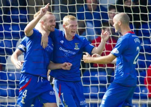 Inverness CT's James Vincent celebrates his opener with Billy McKay and David Raven. Picture: SNS
