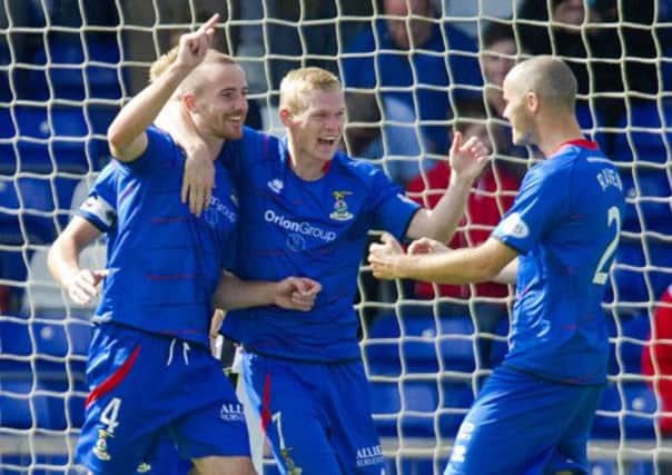 Inverness CT's James Vincent celebrates his opener with Billy McKay  and David Raven. Picture: SNS