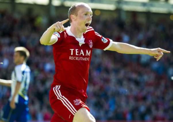 Willo Flood celebrates after scoring Aberdeen's second goal of the game. Picture: SNS