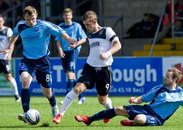 David Templeton is closed down by Forfar's Neil McCabe and Gavin Malin. Picture: SNS