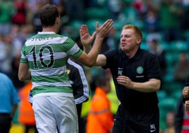 Neil Lennon congratulates Anthony Stokes on his winner, and could sign a new deal this week. Picture: SNS