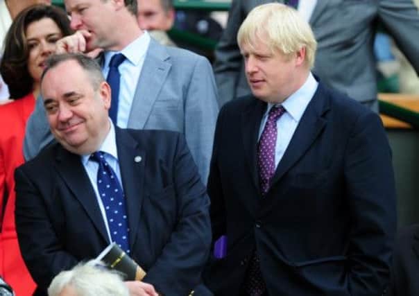 Alex Salmond and Boris Johnson may be of similar mind when it comes to devolved tax powers. Picture:PA