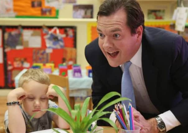 Chancellor George Osborne visited a nursery in Hammersmith yesterday and discussed tax-free childcare proposals. Picture: Getty