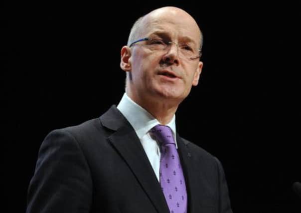 John Swinney: "Scotland is now facing eight years of real-terms spending cuts". Picture: Ian Rutherford