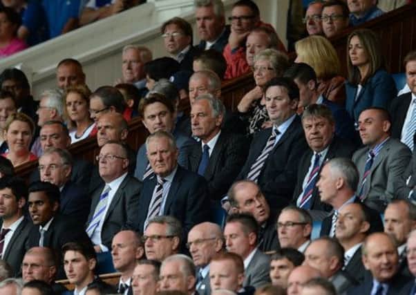 For all his faults Charles Green, centre, has a few things going for him in assessing his suitability to hold power at Ibrox. Picture: SNS