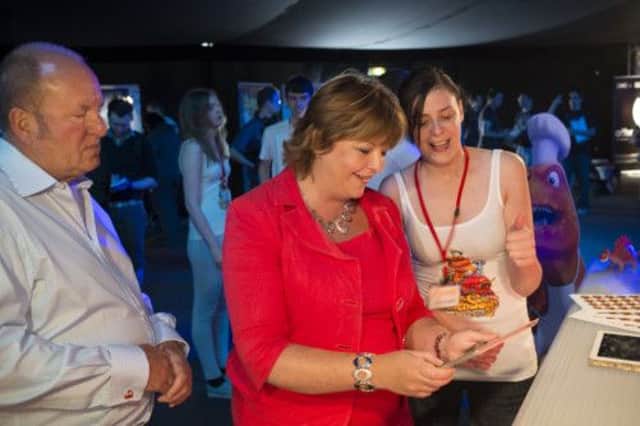 Fiona Hyslop MSP opens the games festival with Tomb Raider creator Ian Livingstone. Picture: Alan Richardson