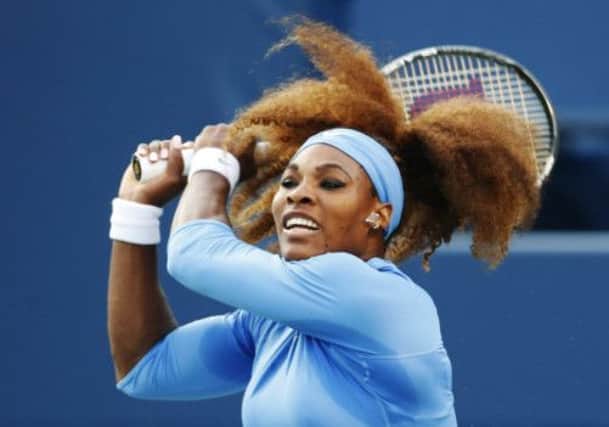 Serena Williams returns a shot during her 6-3, 6-2 win over Francesca Schiavone. Picture: Reuters