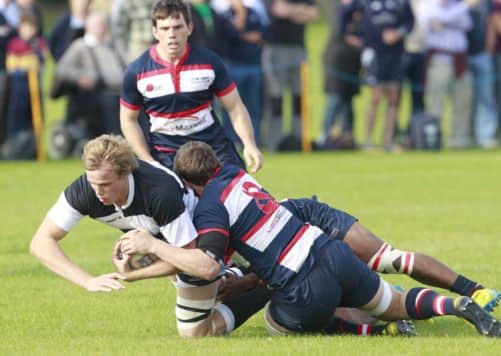 Aberdeen's Tom Preace tackles Johnny Gray of Glasgow at Rubislaw yesterday. Picture: Newsline Scotland