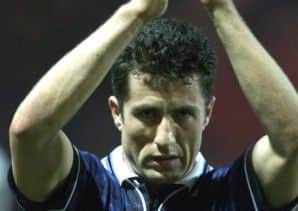 John Collins applauds the fans after Scotland's 1999 win at Wembley. Picture: PA