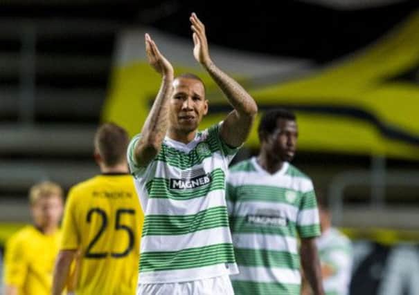Kelvin Wilson waves farewell to the Celtic support. Picture: SNS