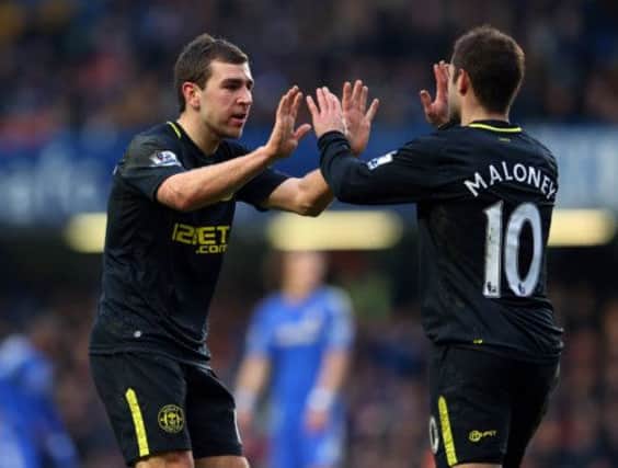 James McArthur and Shaun Maloney will face Manchester United and England at Wembley. Picture: Getty