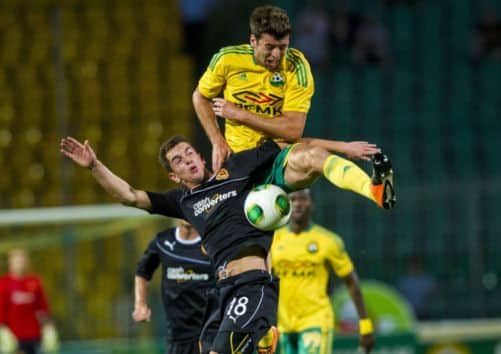 Stuart Carswell, left, was one of the players drafted in as Motherwell put up a battling display against Kuban Krasnodar. Picture: SNS