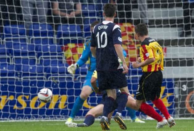 Steven Lawless fires in Partick Thistle's second goal. Picture: SNS