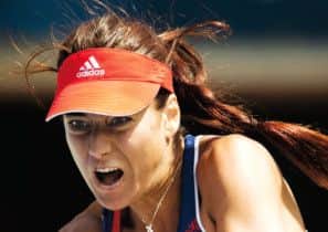 Sorana Cirstea of Romania returns a shot to Li Na of China during their semi-final of the Rogers Cup tournament in Toronto. Picture: Reuters