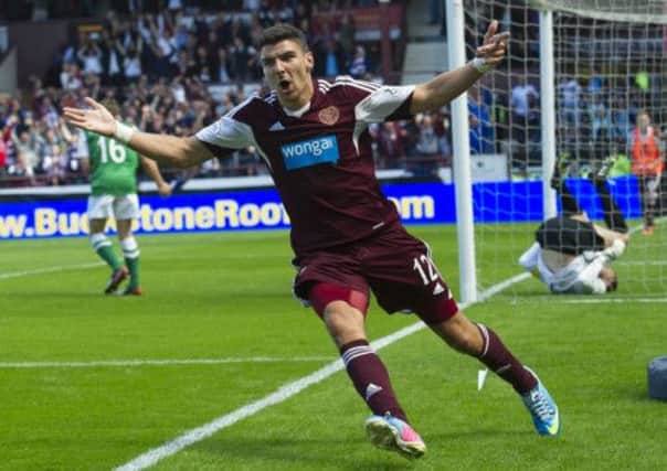 Callum Paterson wheels to away to celebrate his goal. Picture: SNS