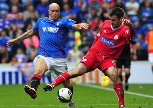 Rangers star performer Nicky Law challenges Brechins Paul McLean in the Light Blues 4-1 win at Ibrox. Picture: Robert Perry