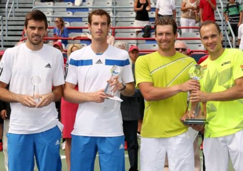 Scots Colin Fleming, left, and Andy Murray lost to Alexander Peya and Bruno Soares, right, in Montreal. Picture: Getty Images