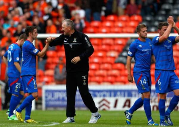 Terry Butcher celebrates with Nick Ross at full time. Picture: Getty