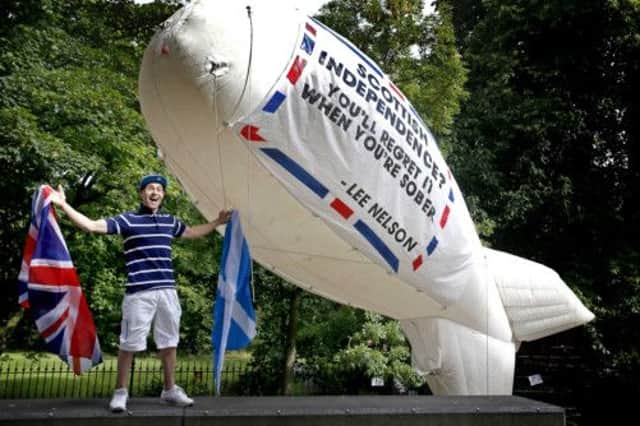 Comedian Lee Nelson launches a hot air blimp promoting the Union in Edinburgh. Picture: Fraser Bremner