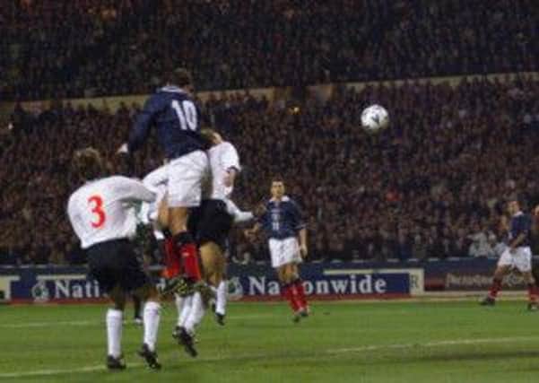 Don Hutchison gets on the end of a Neil McCann cross to head home the only goal of the game in the 1-0 win at Wembley in 1999. Picture: Donald Macleod