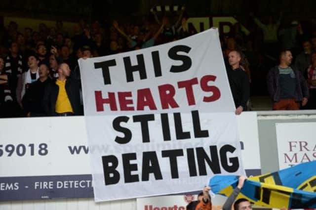 Hearts fans rally behind their stricken club. Picture: SNS