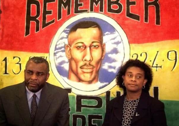 Neville and Doreen Lawrence, pictured in 1999, attend a press conference in London. Picture: Reuters
