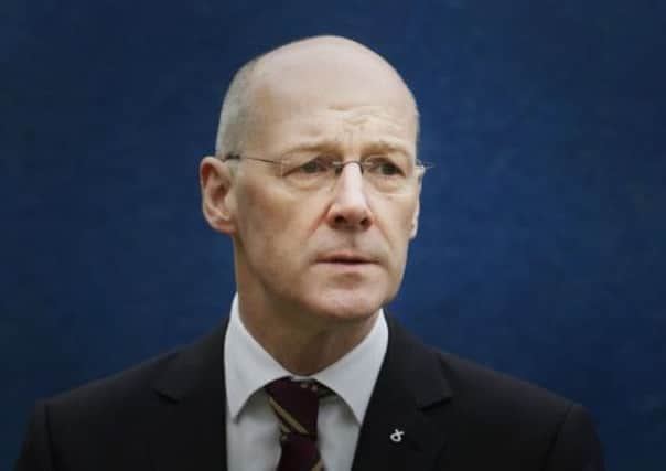 John Swinney's plan gives an option to treat the financial sector separately'.  Picture: PA