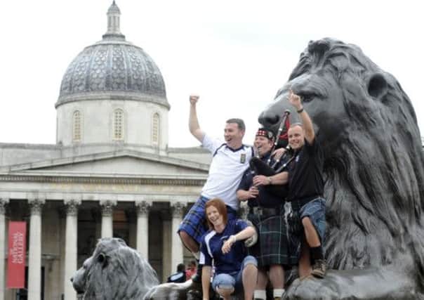 Fans gather in Trafalgar Square. Picture: Phil Wilkinson