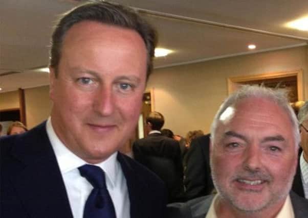 David Cameron, left, with Laurie Clark. Picture: Complimentary